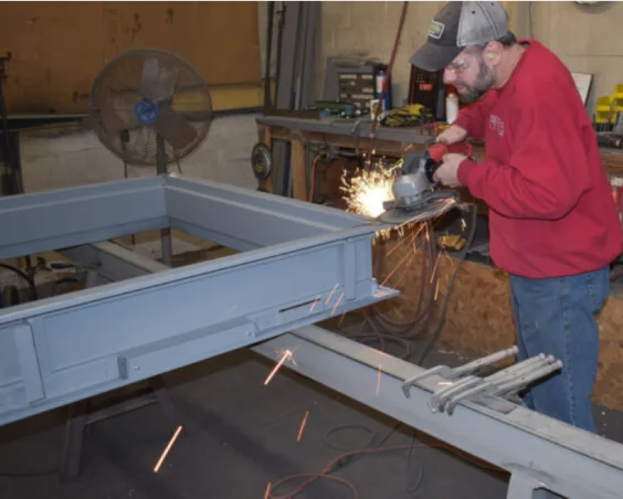 man welding
